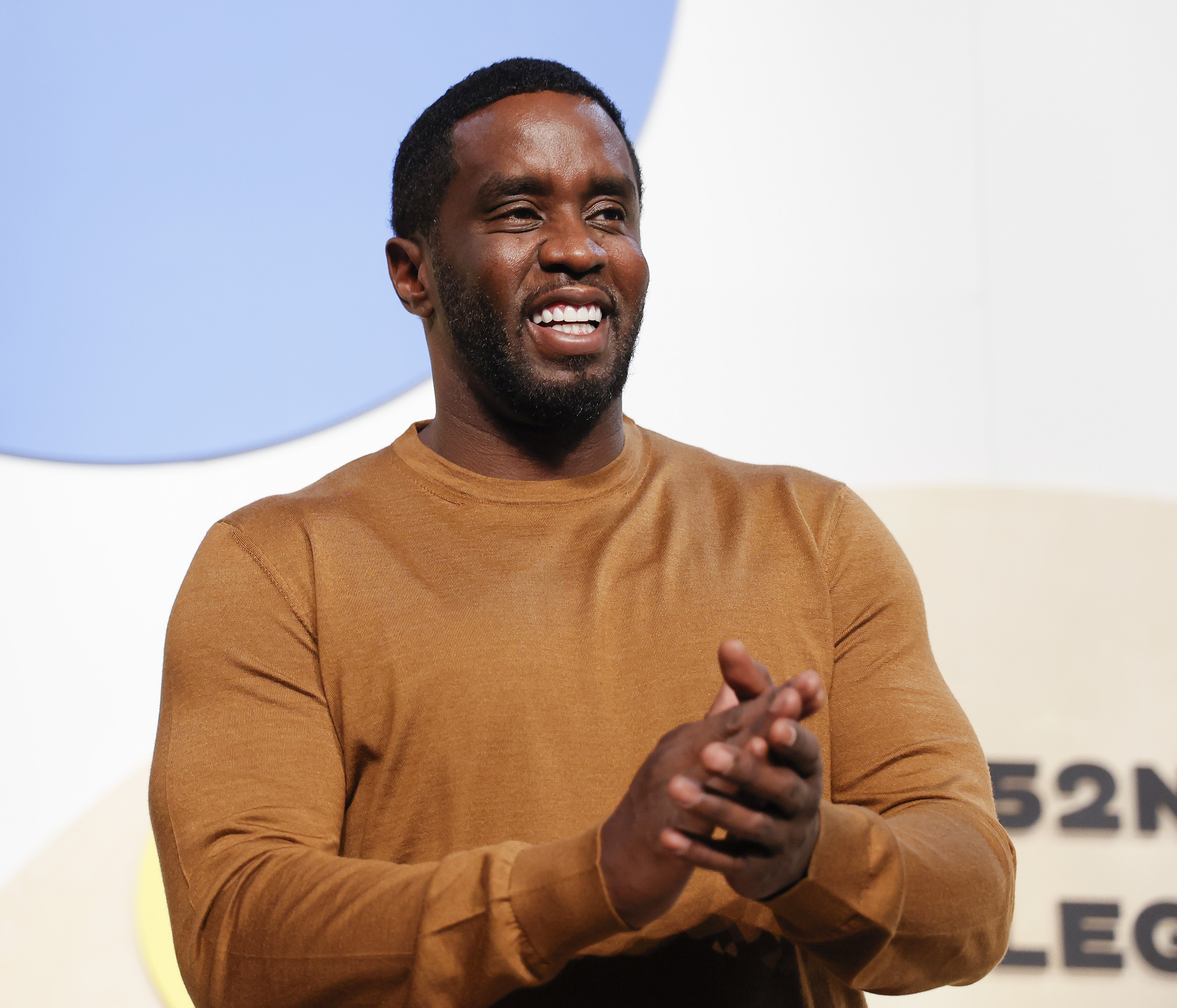 Sean Combs clapping in 2023