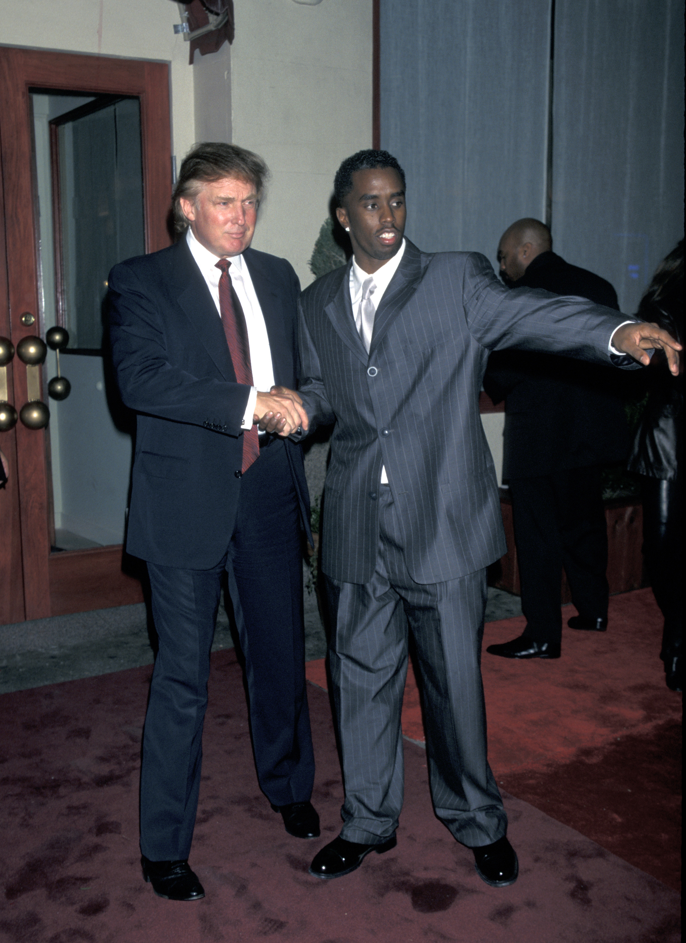 Donald Trump and Sean Combs at the grand opening of Combs' restaurant