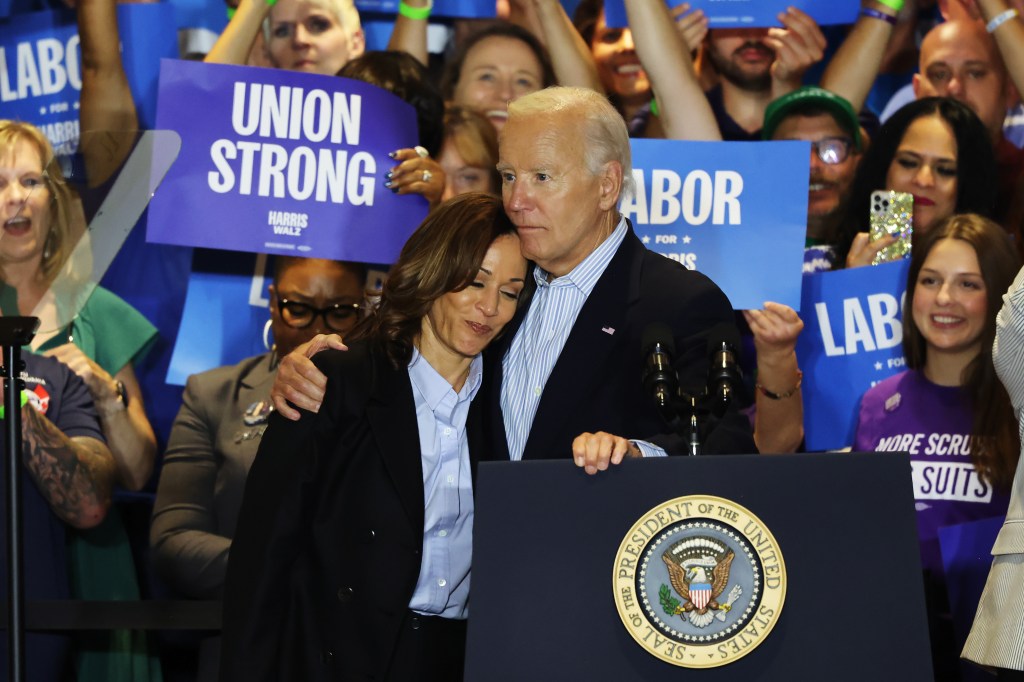 President Biden embracing Vice President Harris at a campaign event.