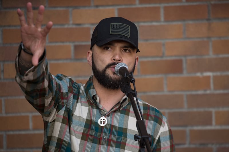 Joey Gibson, the founder of Patriot Prayer, speaks during a Patriot Prayer rally that was met by counter-protestors at the University of Washington on February 10, 2018 in Seattle, Washington.