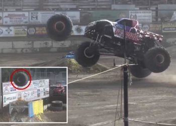 800-pound wheel flies off monster truck during rally, careens out of arena and demolishes car in parking lot, wild video shows