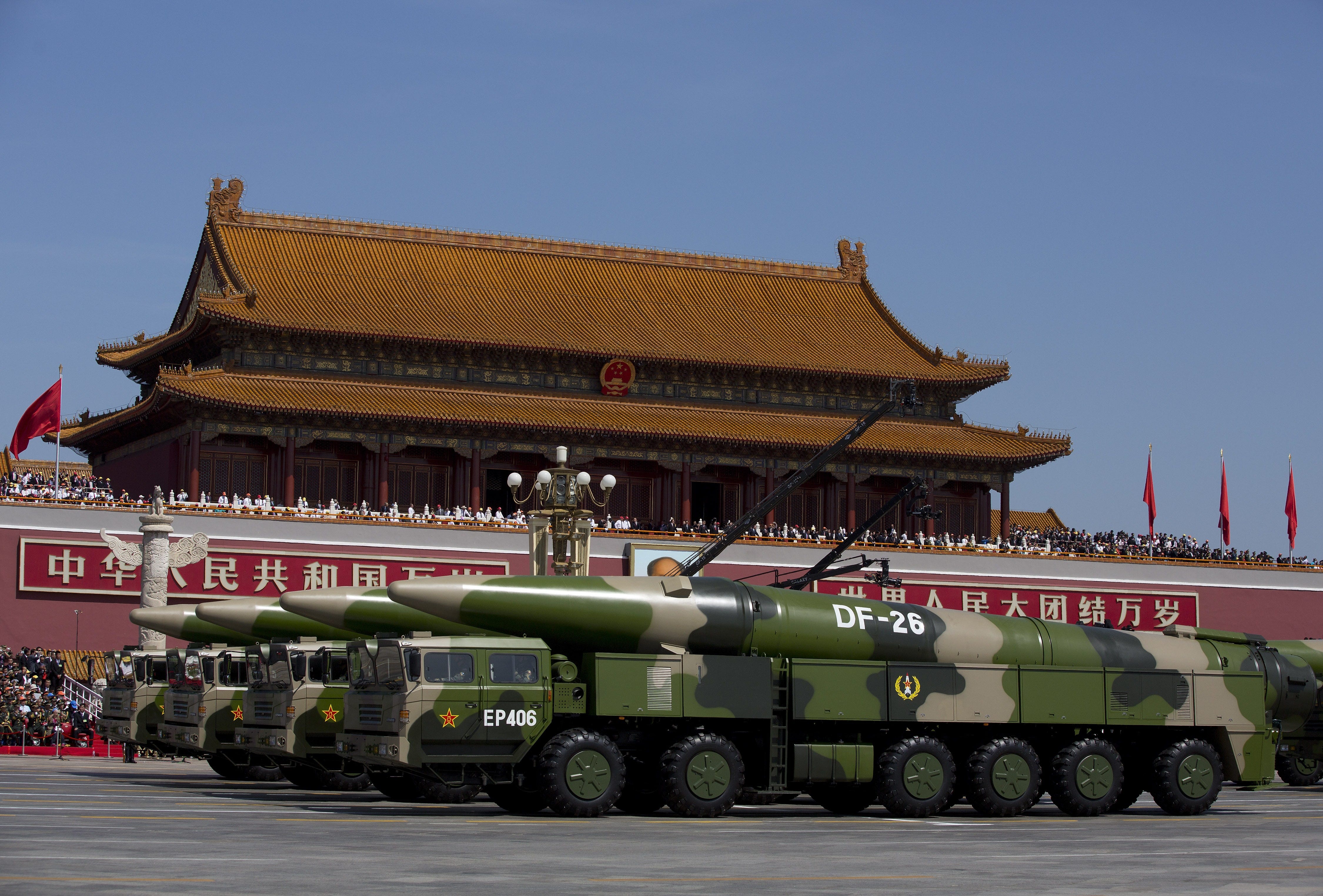 Military vehicles carrying DF-26 ballistic missiles, drive past the Tiananmen Gate during a military parade to mark the 70th anniversary of the end of World War Two on September 3, 2015, in Beijing, China.