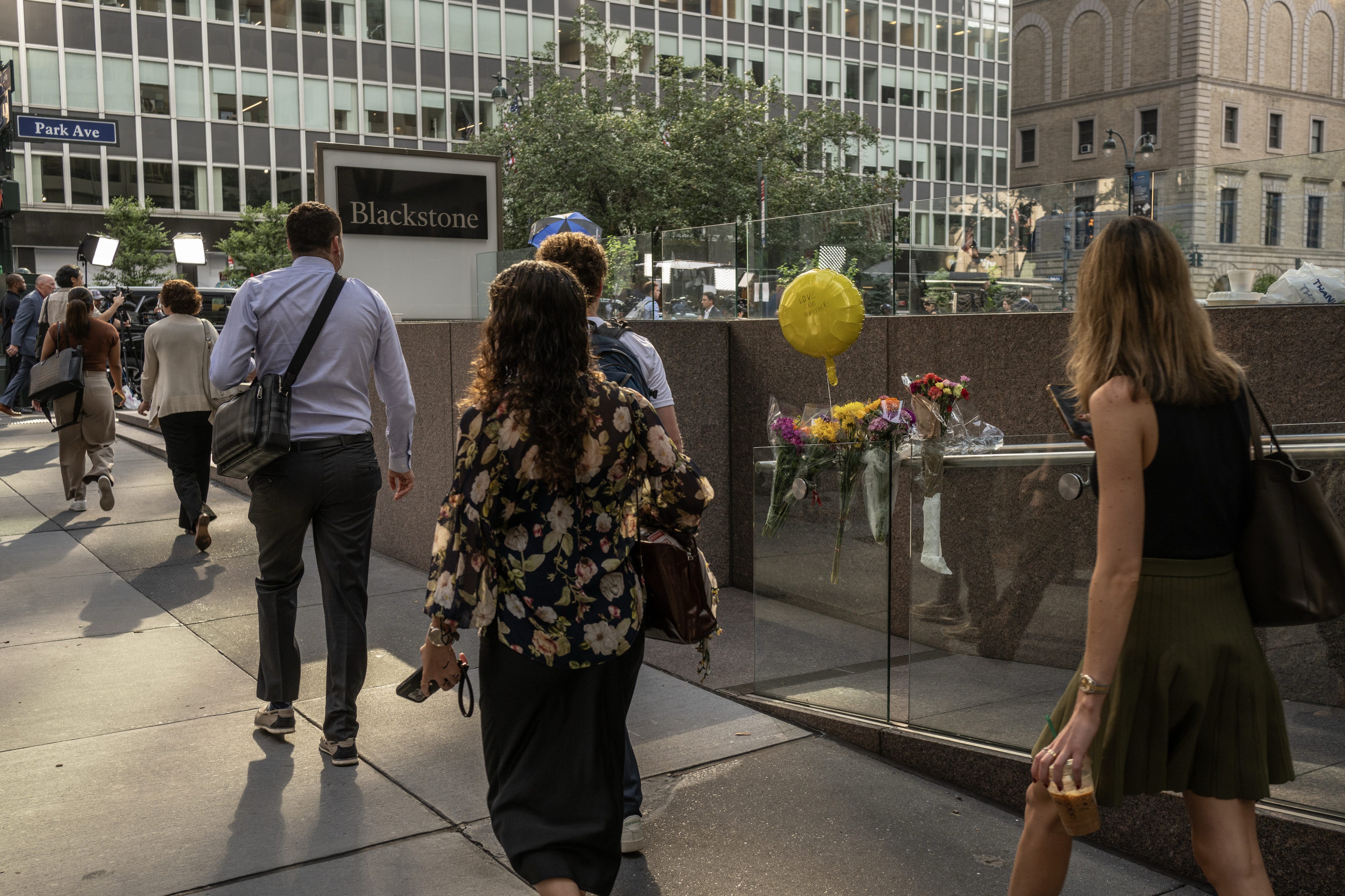 Memorial flowers outside the Blackstone headquarters at the scene of a shooting from Monday in New York, US, on Tuesday, July 29, 2025.