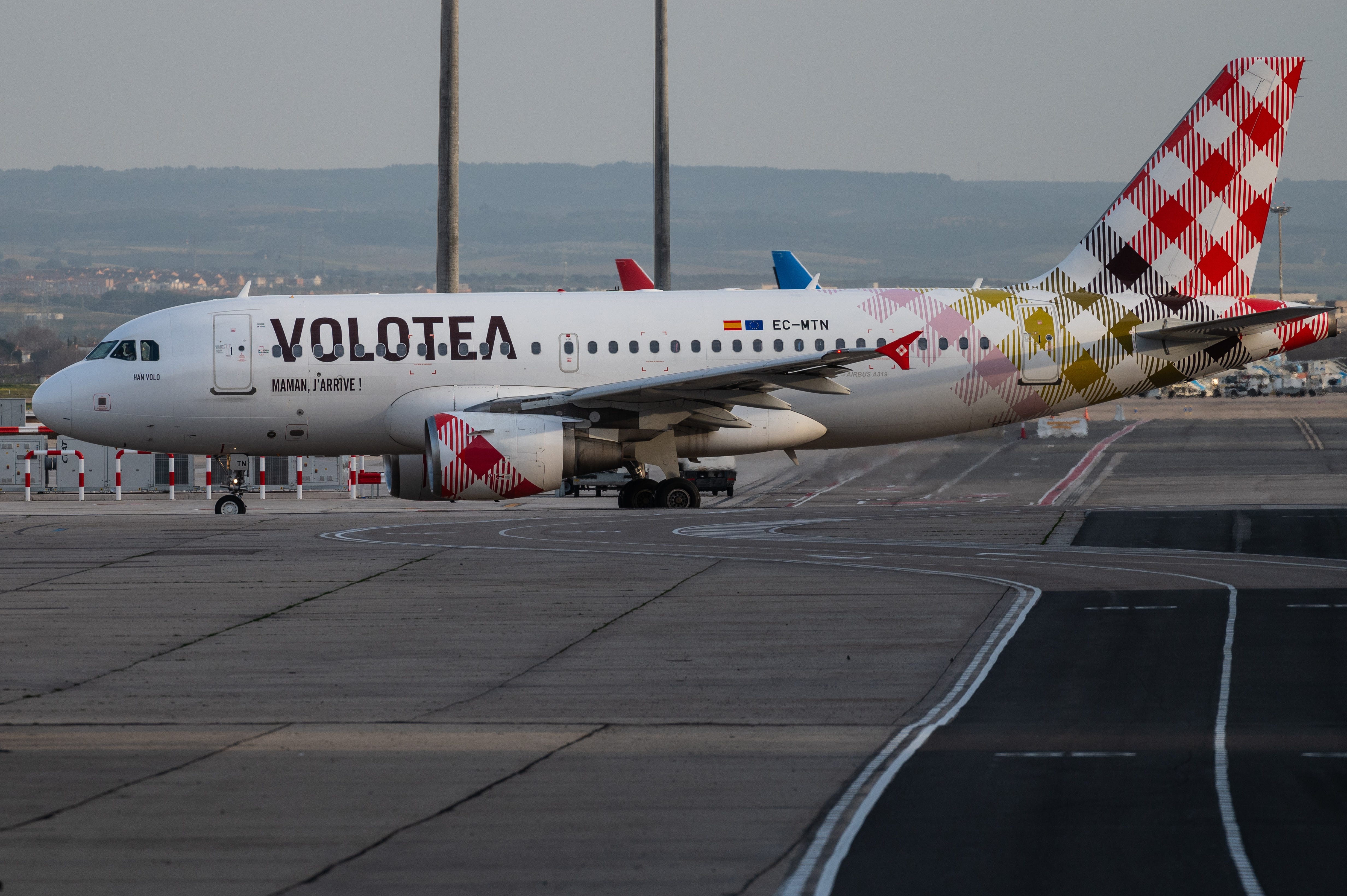 An Airbus A319 commercial flight of Volotea in a runway of Adolfo Suarez Madrid-Barajas Airpor