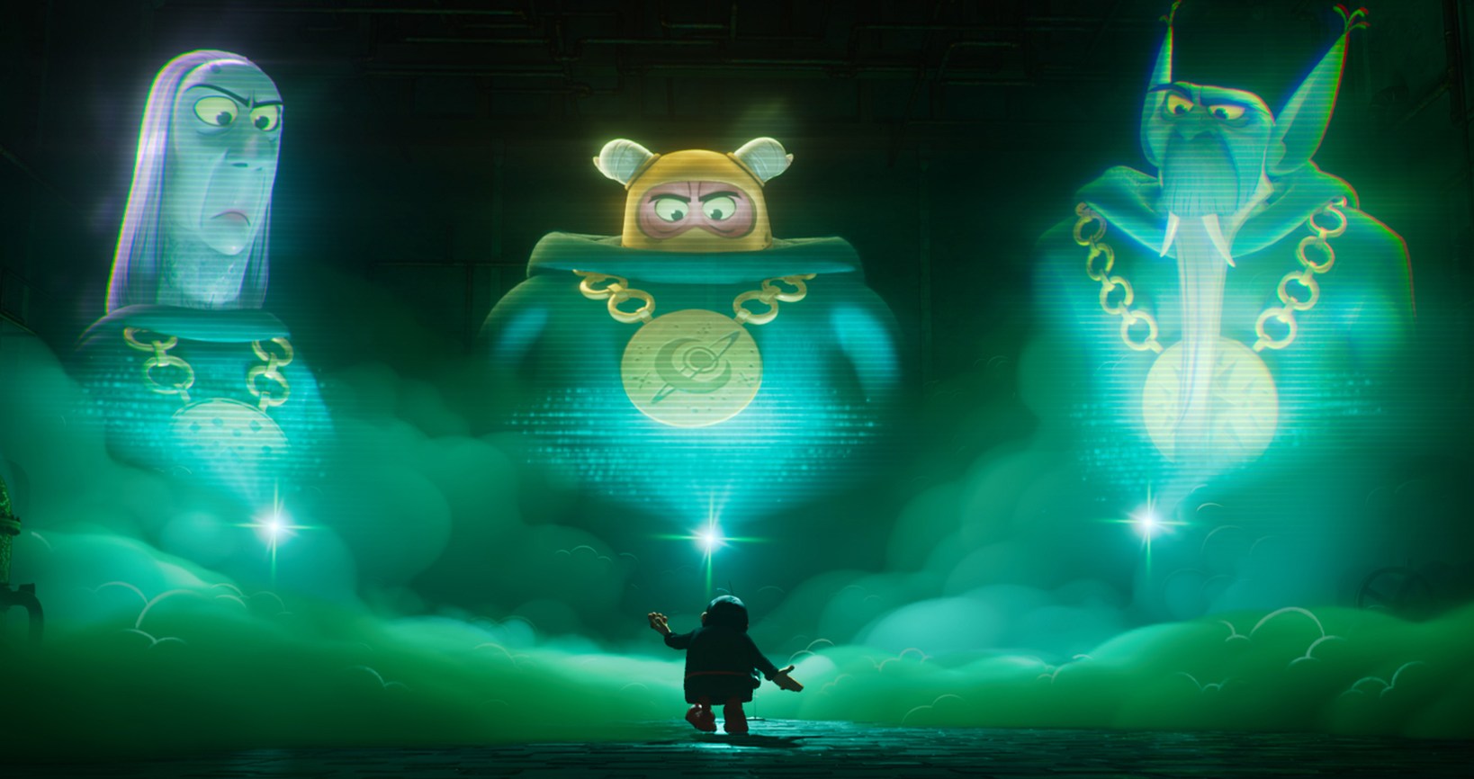 Three evil wizards loom in giant green projections over a silhouetted fourth in the 2025 Smurfs movie