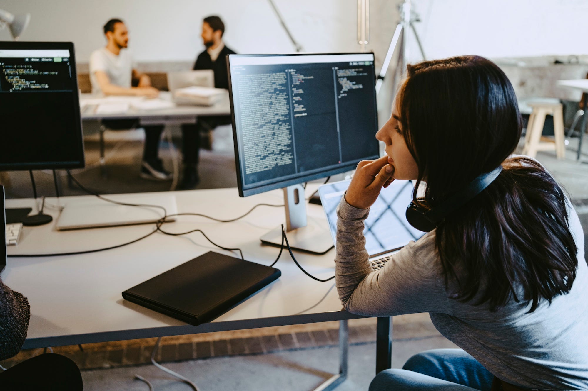 A computer programmer or software developer working in an office