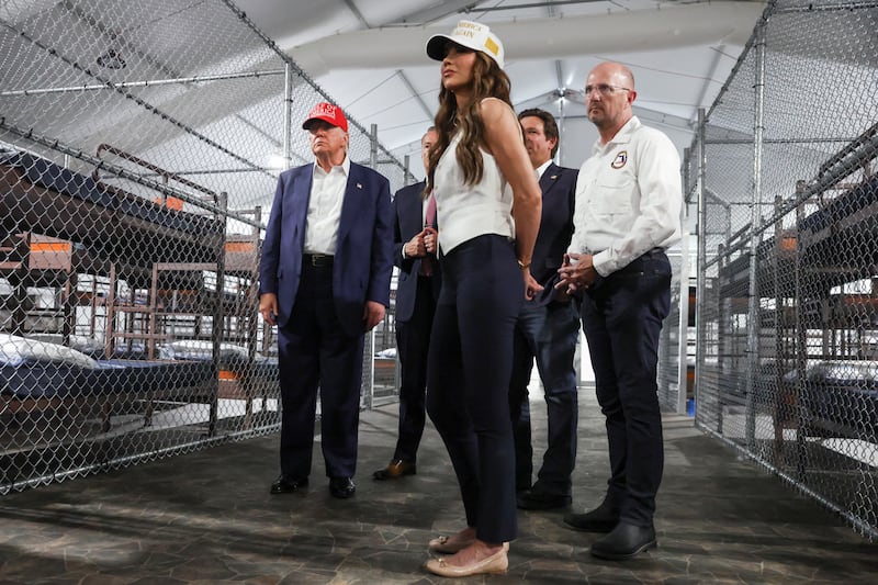 Donald Trump, Florida Gov. Ron DeSantis and Homeland Security Secretary Kristi Noem visit Alligator Alcatraz, where detainees have since reported inhumane conditions.