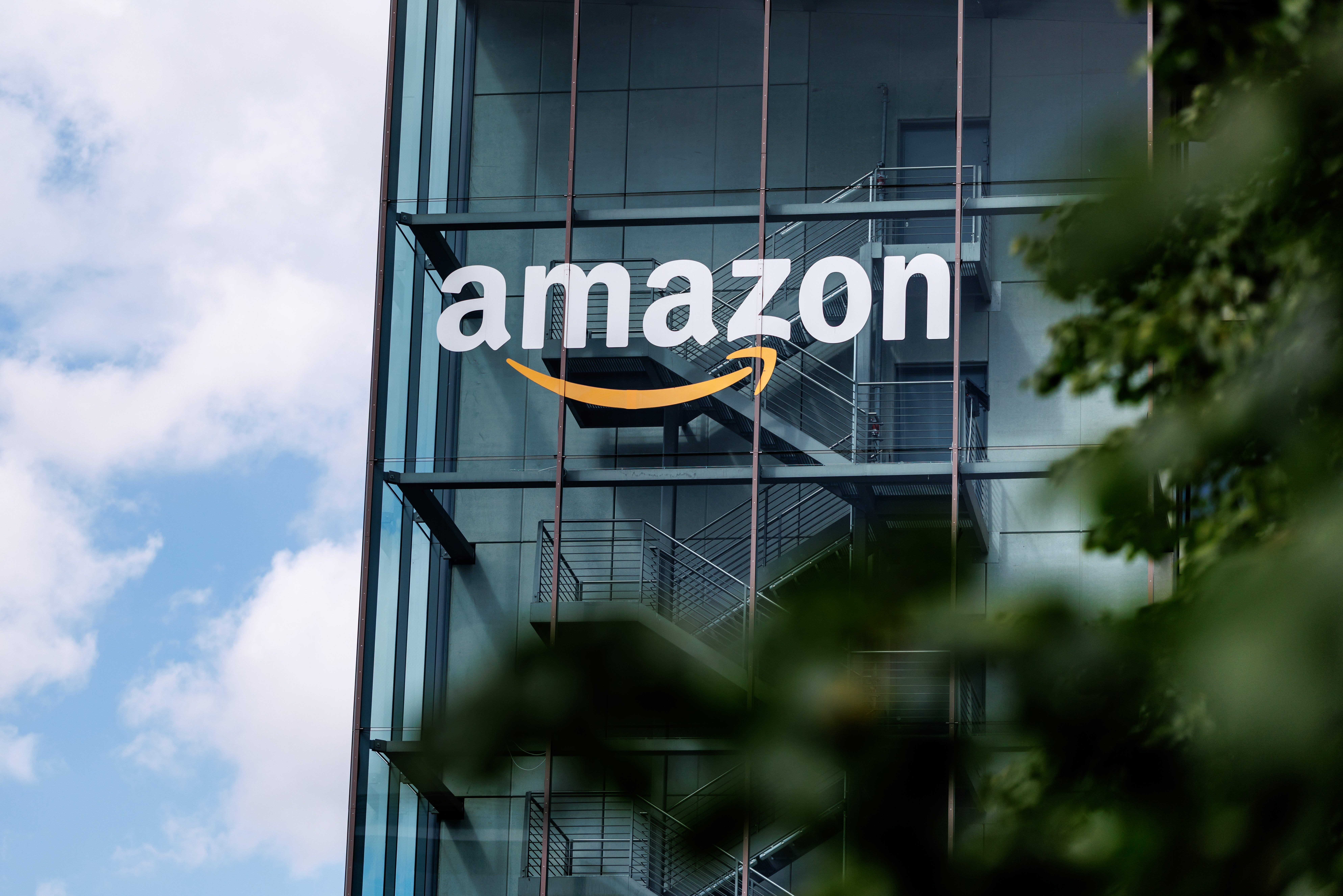 The Amazon logo on the façade of an office building