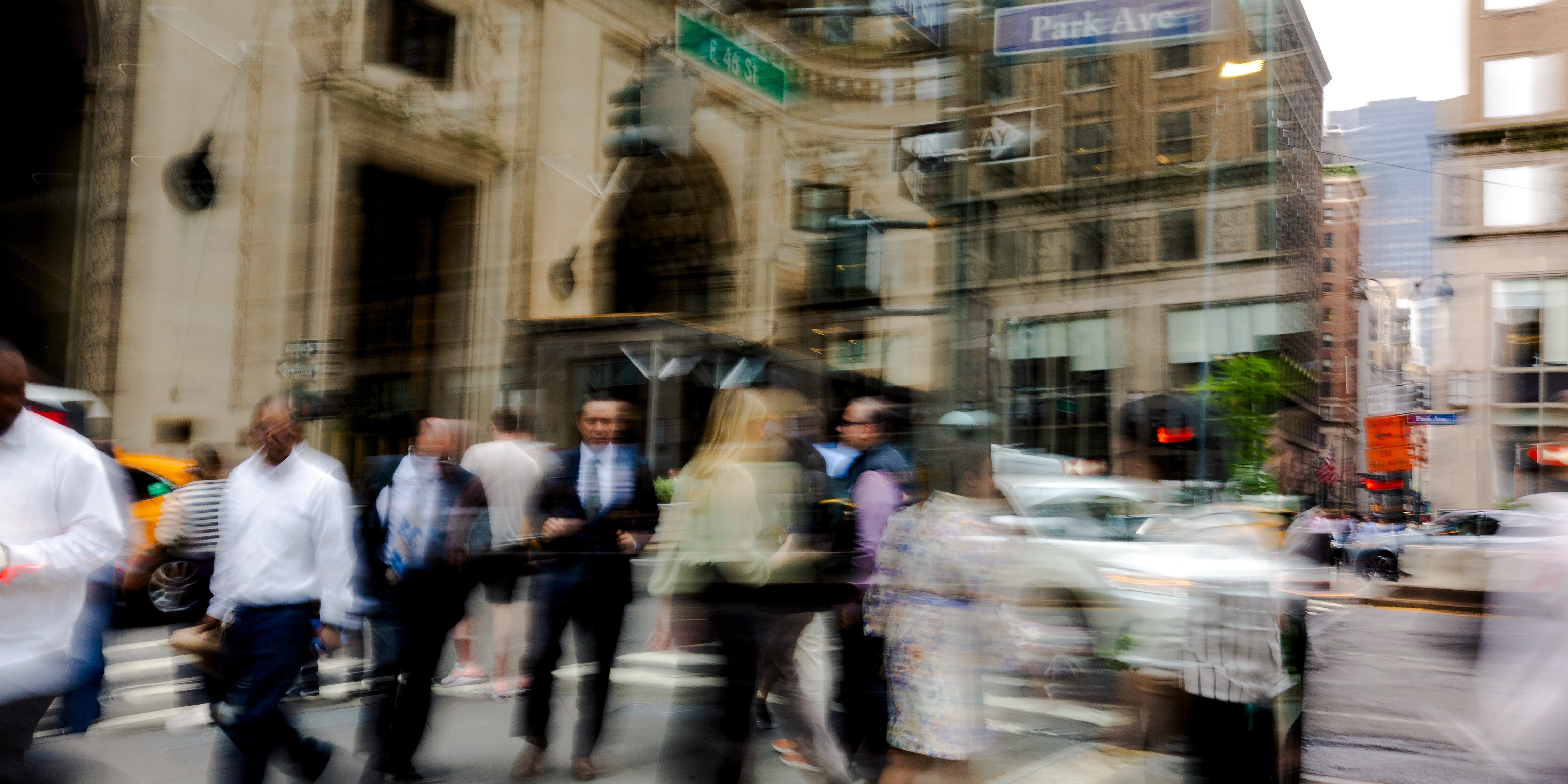 Business people milling around Midtown Manhattan