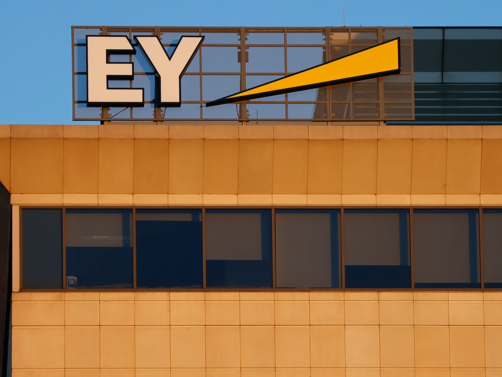 Ernst and Young logo on top of a building