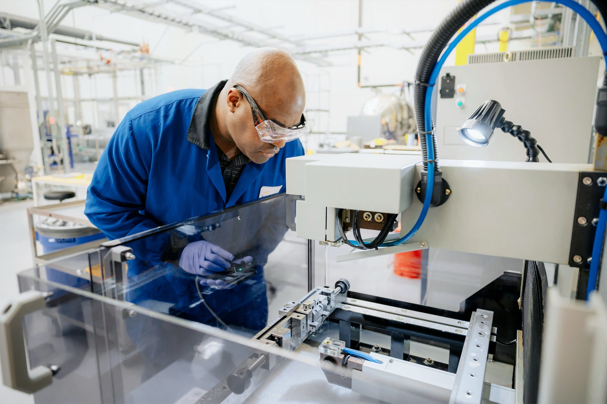 A worker at an MP Materials facility.
