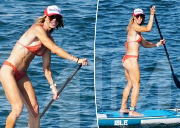 Bikini-clad Lara Trump shows off her toned body while paddleboarding with husband Eric