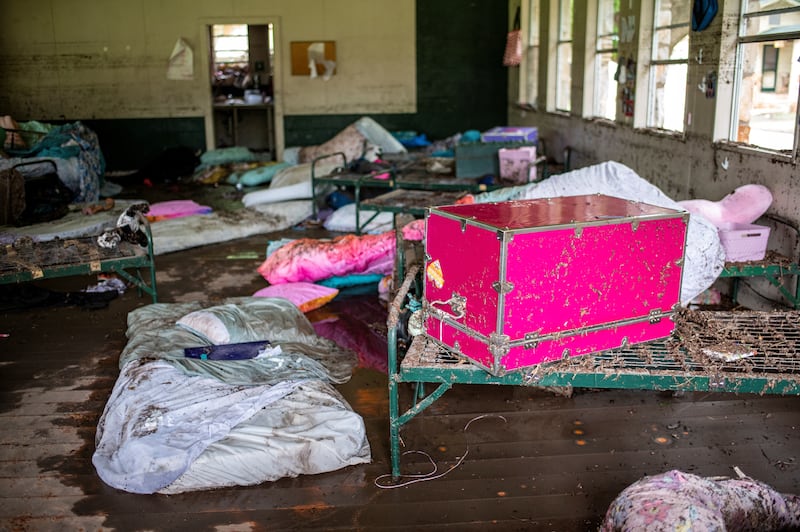 Items lie scattered inside a cabin at Camp Mystic after deadly flooding in Kerr County, Texas, U.S., July 5, 2025.   REUTERS/Sergio Flores