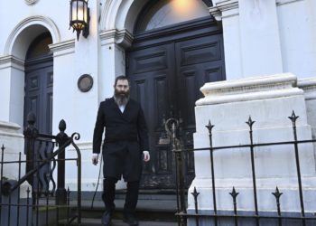 Congregation flees after arsonist sets fire to an Australian synagogue door
