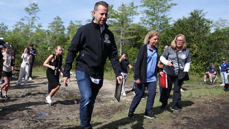 OCHOPEE, FLORIDA - JULY 12: Rep. Jared Moskowitz (D-FL) and Rep. Debbie Wasserman Schultz (D-FL) prepare to visit "Alligator Alcatraz" at the Dade-Collier Training and Transition Airport on July 12, 2025 in Ochopee, Florida. Members of Congress were given their first visit to the new state-managed immigration detention facility in the Florida Everglades that officials have named “Alligator Alcatraz.” (Photo by Joe Raedle/Getty Images)