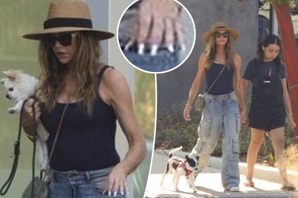 Denise Richards ditches wedding ring after estranged husband Aaron Phypers accuses her of affair, drug problem