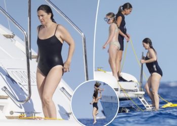 Drew Barrymore takes a dip in black swimsuit on yacht in St. Tropez