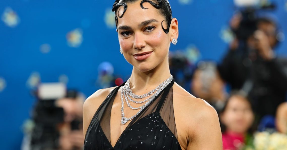 Dua Lipa Wore A Bridal Cutout Dress To Schiaparelli’s Fall 2025 Show