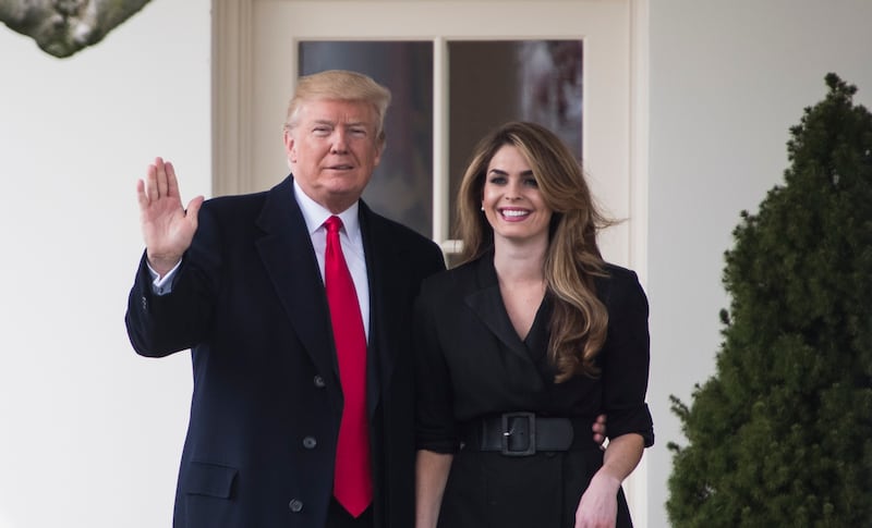 WASHINGTON, DC - MARCH 29: President Donald J. Trump waves beside White House Communications Director Hope Hicks as he walks from the Oval Office to board Marine One to depart from the South Lawn of the White House on Thursday, March 29, 2018 in Washington, DC. (Photo by Jabin Botsford/The Washington Post via Getty Images)
