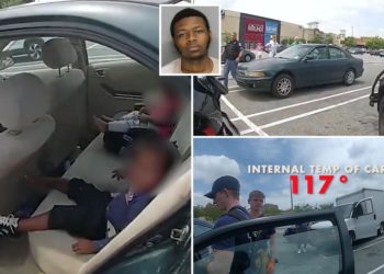 Georgia police officers break into car with two crying children trapped in 117-degree heat outside mall: video