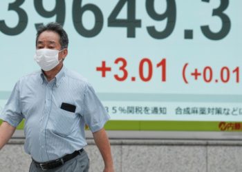 Global shares are mostly lower after Wall Street closes at new record highs