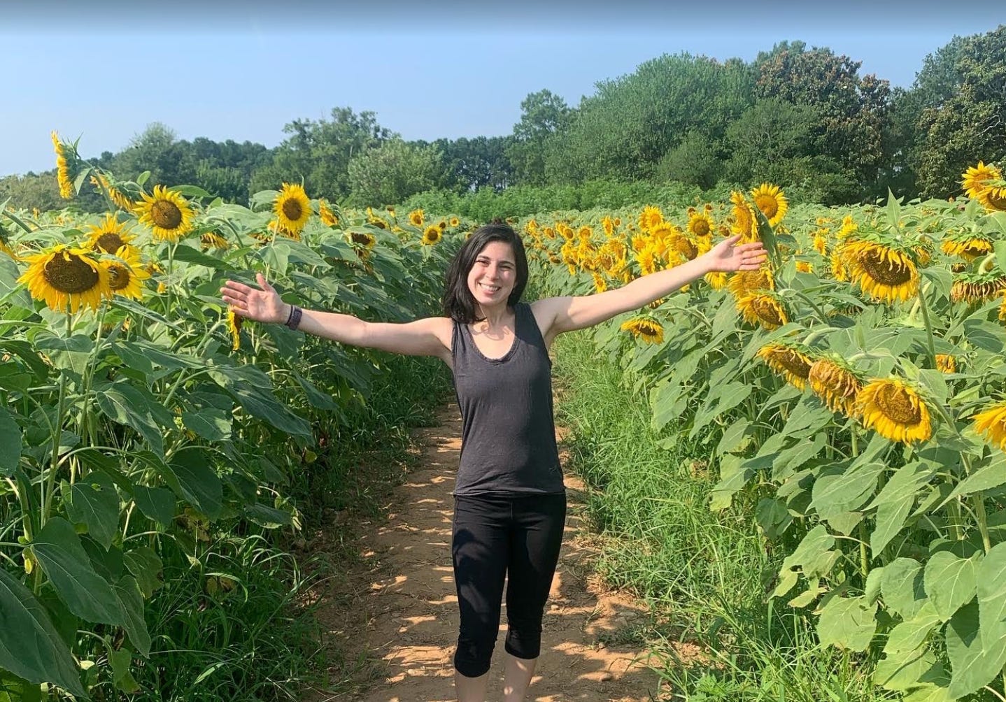 The writer in a flower field in North Carolina.