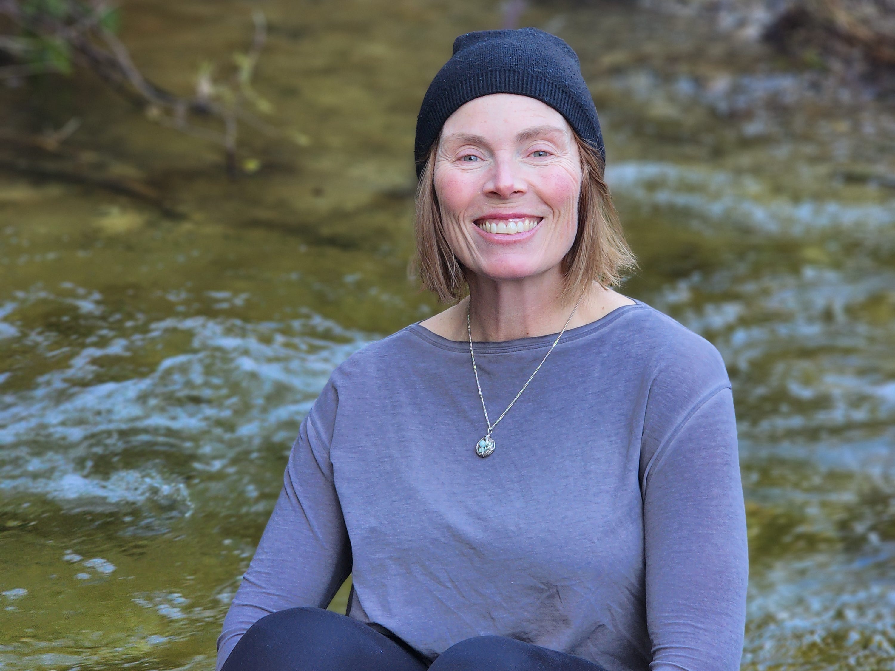 Jennifer McGuire in hat and long sleeves