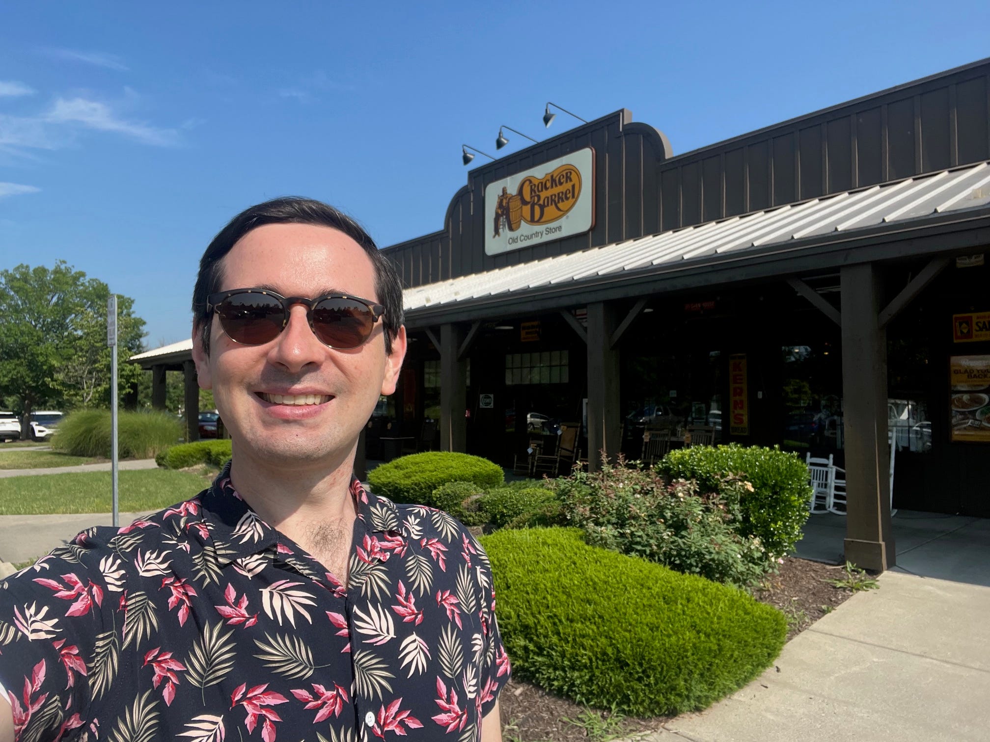 The author stands outside a Cracker Barrel restaurant in Virginia.