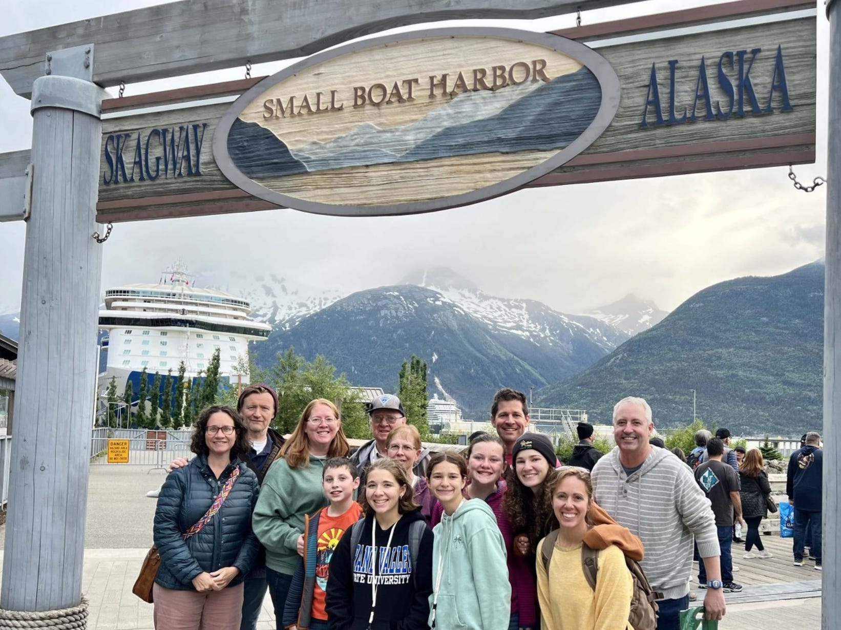 The writer's family about to get on a cruise ship to Alaska, pictured in the background.