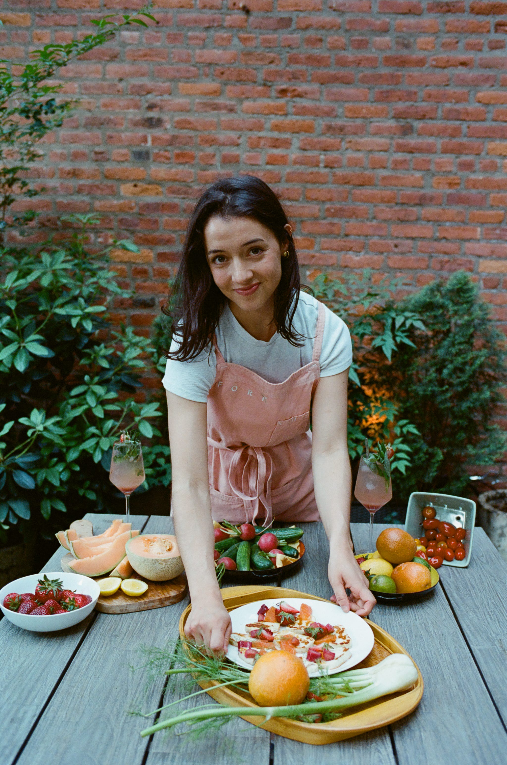 Maddy DeVita holding food