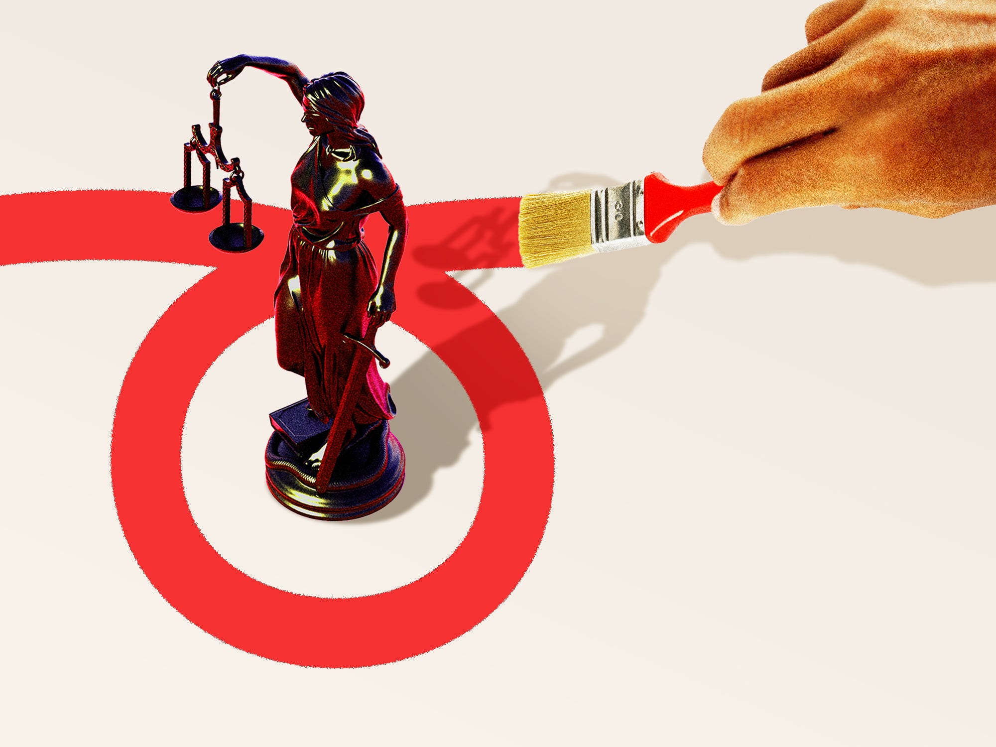 A statue of Justice inside of a loop hole being painted