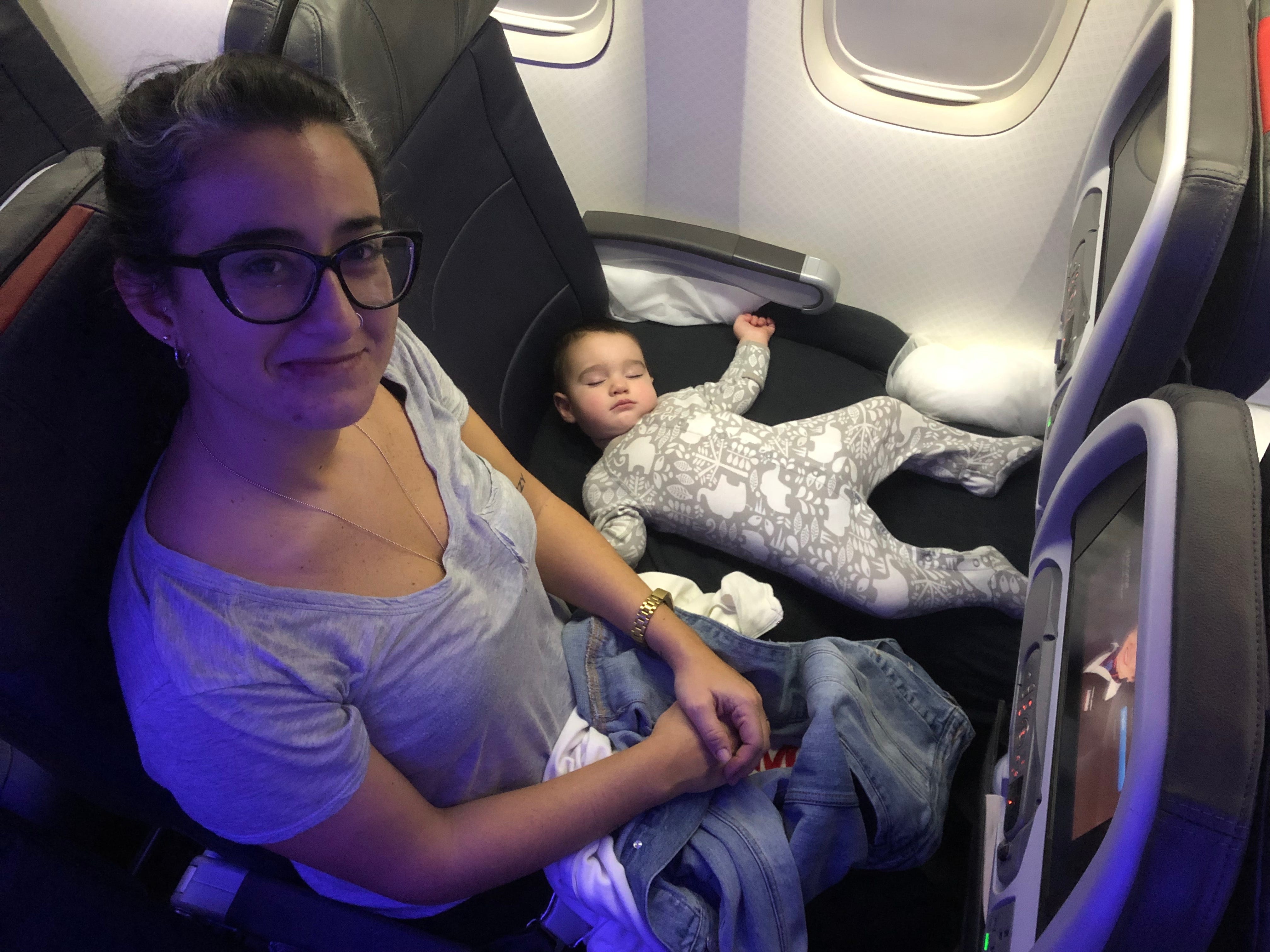 Baby sleeping on plane
