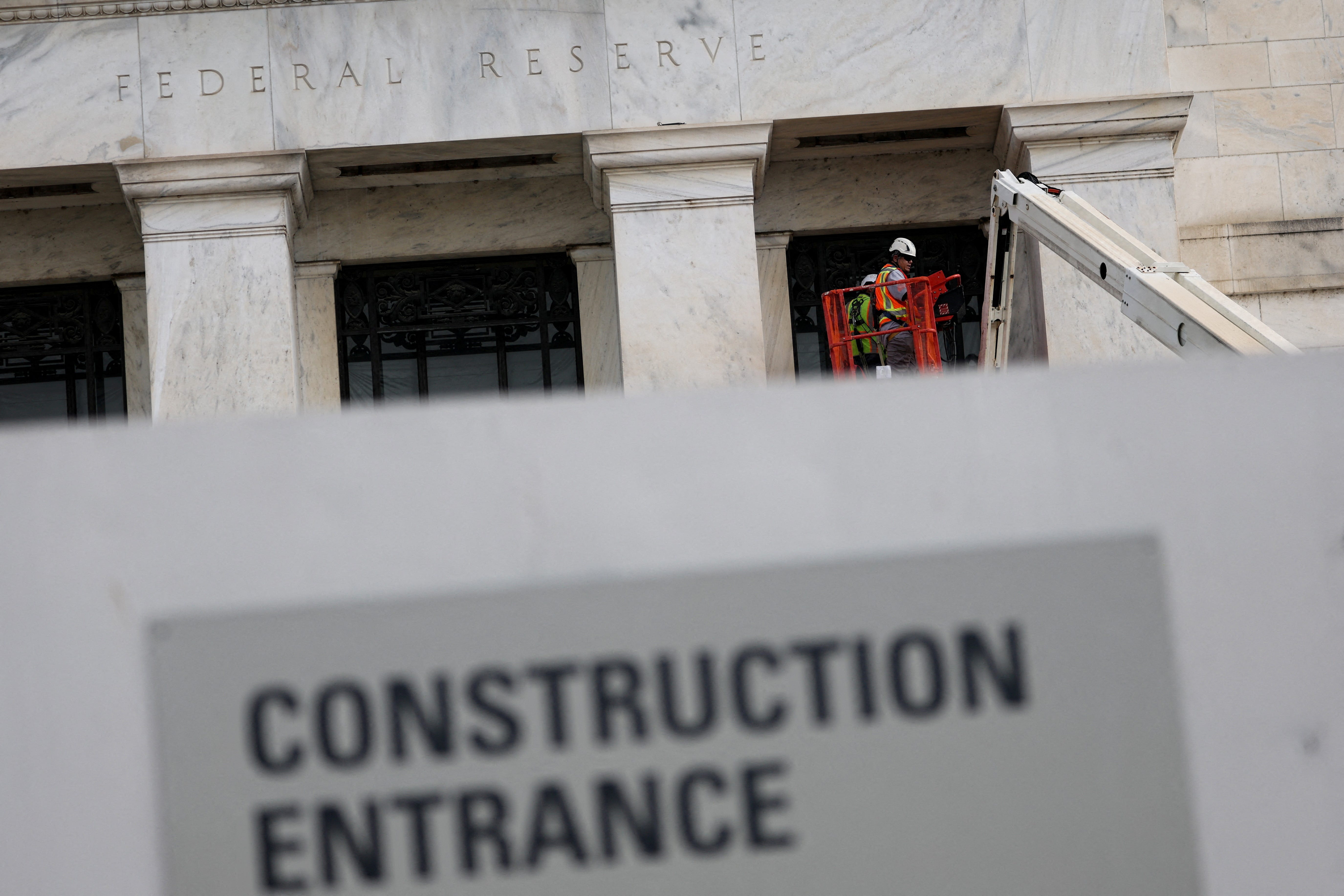 Construction work continues at the U.S. Federal Reserve building as U.S. President Trump assails Fed Chair Powell