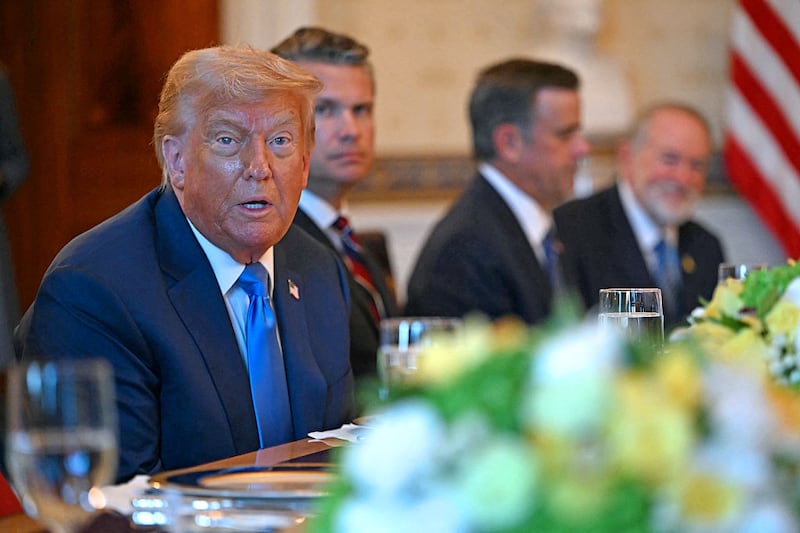 US President Donald Trump meets with unseen Israeli Prime Minister Benjamin Netanyahu at the Blue Room of the White House in Washington, DC, on July 7, 2025. Prime Minister Netanyahu will meet Monday with President Trump, who expressed hope for a "deal this week" between Israel and Hamas that sees hostages released from the Gaza Strip. Indirect negotiations between Israel and Hamas began on July 6 in Doha, aiming to broker a ceasefire and reach an agreement on the release of hostages in exchange for Palestinian prisoners. (Photo by ANDREW CABALLERO-REYNOLDS / AFP) (Photo by ANDREW CABALLERO-REYNOLDS/AFP via Getty Images)