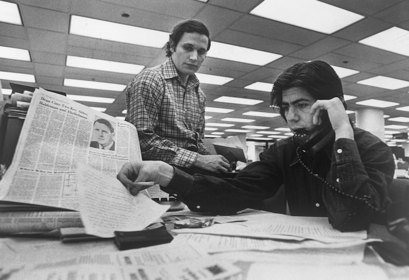 Bob Woodward and Carl Bernstein investigated the famous Watergate scandal that involved Richard Nixon.
