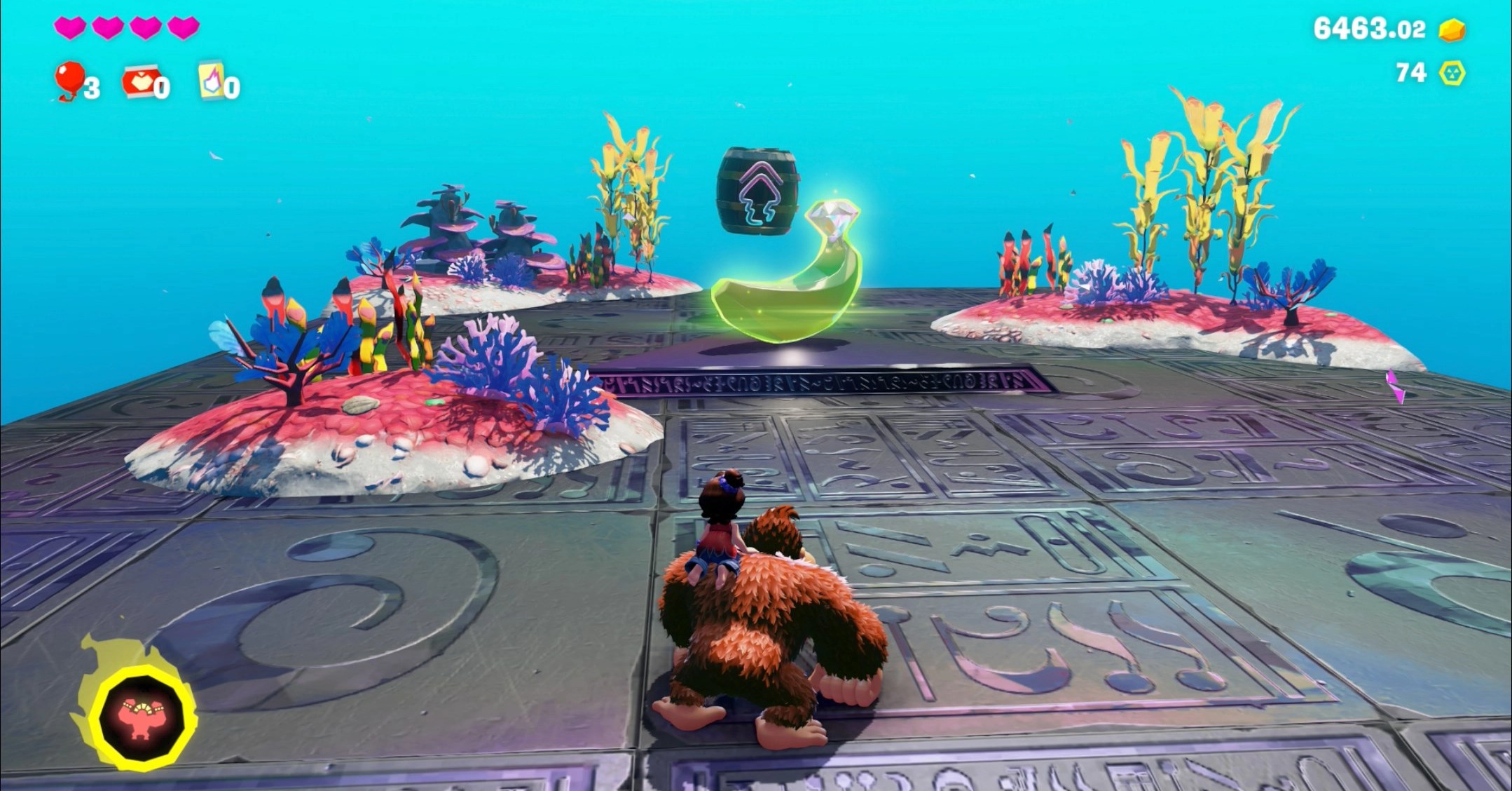 DK stands in front of a Banandium Gem on a silver platform underwater in the Lagoon Layer in Donkey Kong Bananza