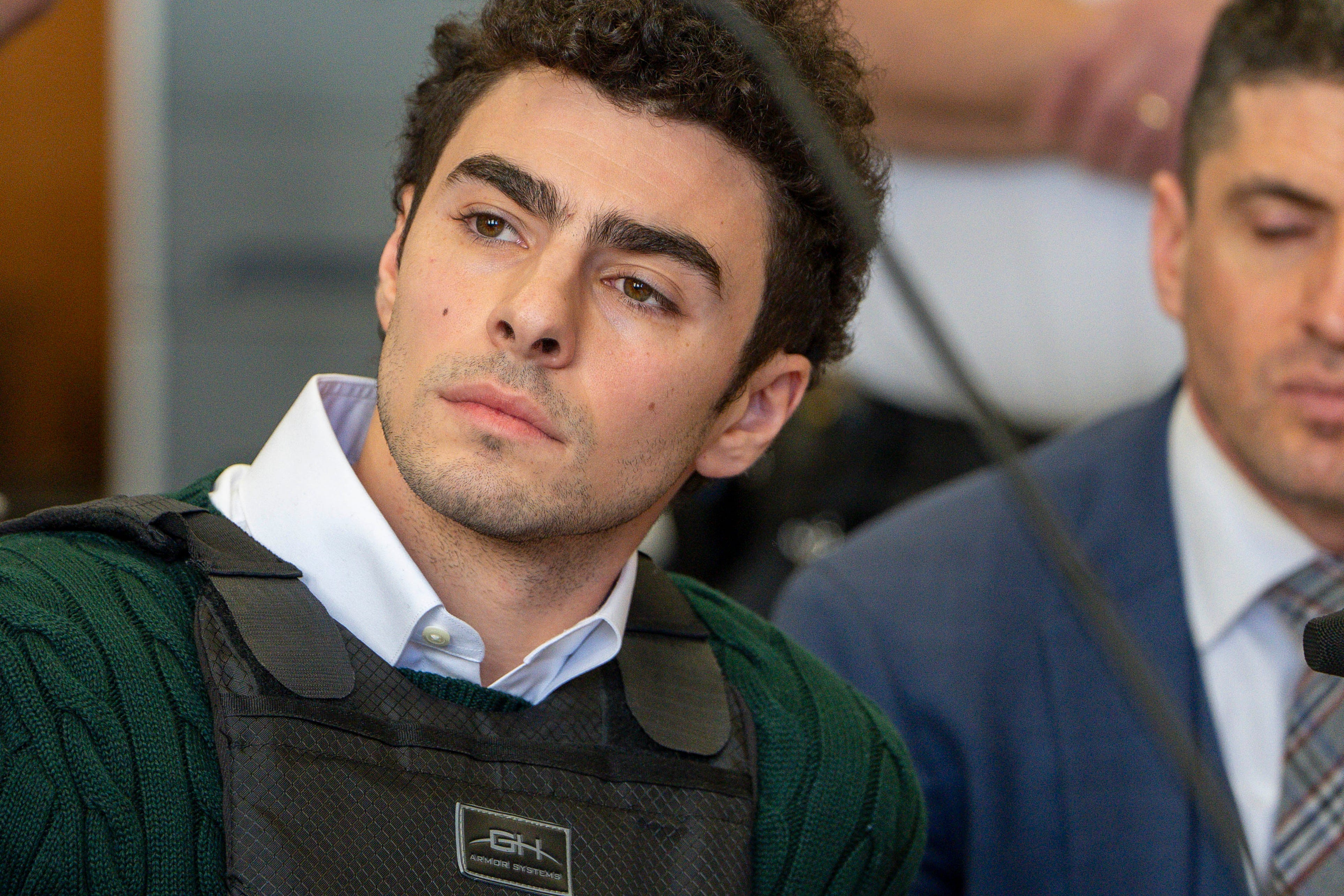 Luigi Mangione in state court in Manhattan, where he is accused of murdering UnitedHealthcare CEO Brian Thompson as an act of terrorism.