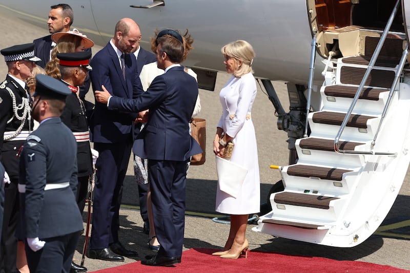 NORTHOLT, ENGLAND - JULY 8: France's President Emmanuel Macron and his wife Brigitte Macron are greeted by Prince William, Prince of Wales and Catherine, Princess of Wales upon arrival at RAF Northolt on July 8, 2025 in London, England. President Emmanuel Macron and Mrs Brigitte Macron visit the UK in the first visit State Visit made by France in 17 years. They are staying at Windsor Castle, hosted by King Charles III and Queen Camilla, and a banquet will be held there in their honour. The Macrons will visit Imperial College, and the President will address Parliament during his stay. (Photo by Geoff Pugh - WPA Pool/Getty Images)