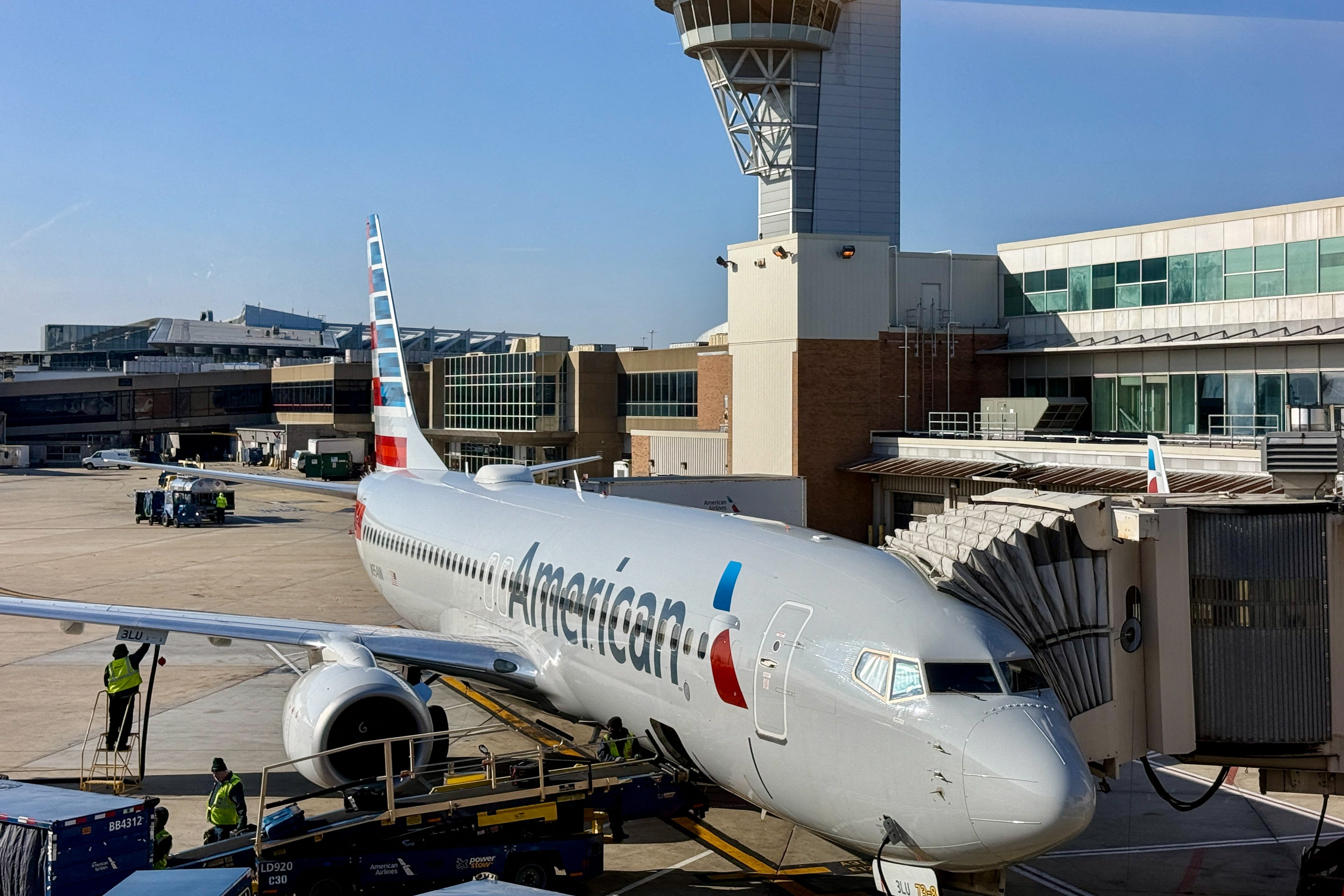 An American Airlines passenger plane is parked at a gate at Philadelphia International Airport (PHL) in Philadelphia, Pennsylvania on December 13, 2024.