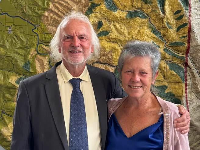 The author and her husband in formal wear at a wedding in Peru.