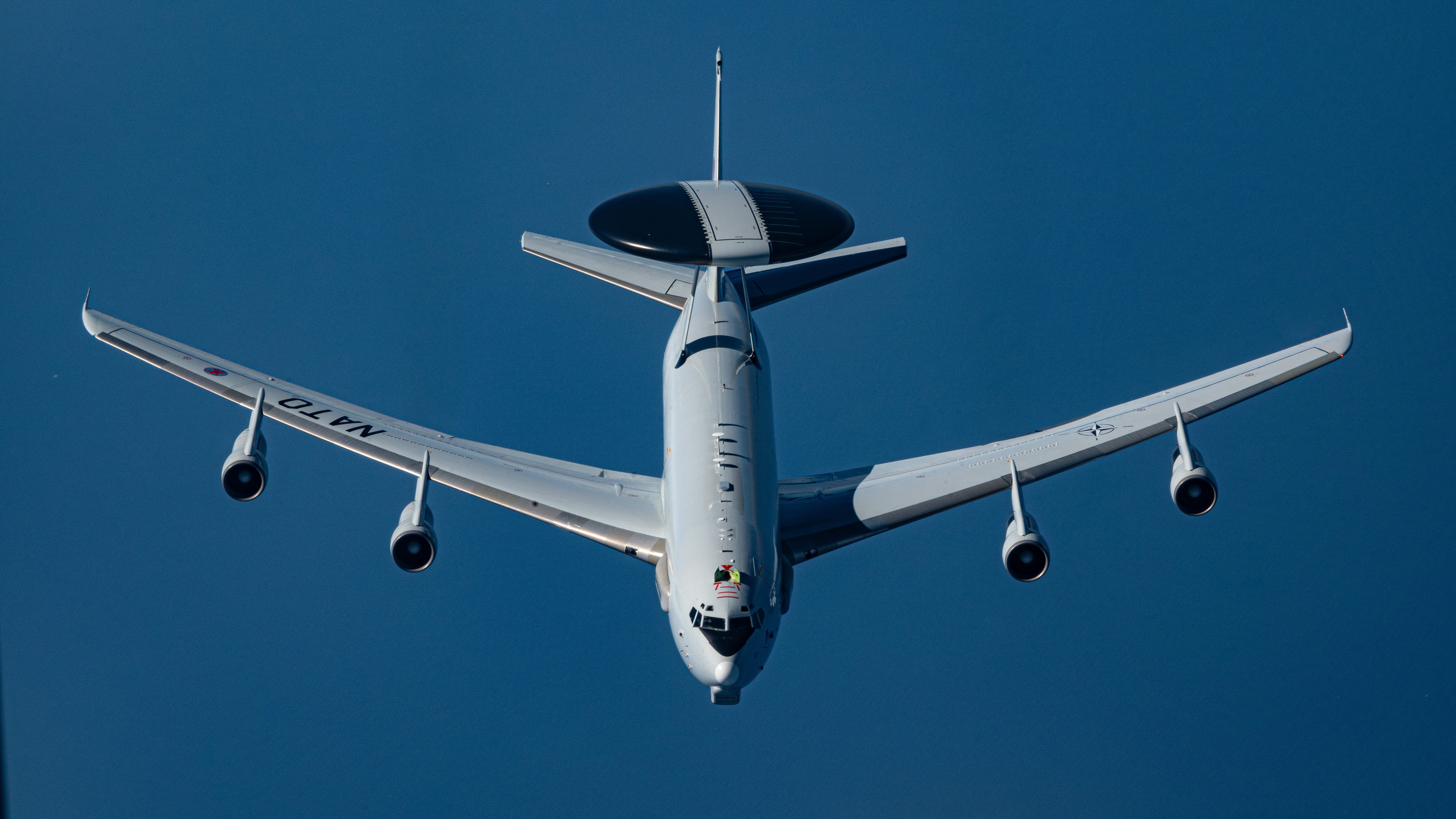 A NATO E-3 Sentry approaches a KC-135 Stratotanker from the 100th Air Refueling Wing during an aerial refueling mission over Spain, July 2, 2025.