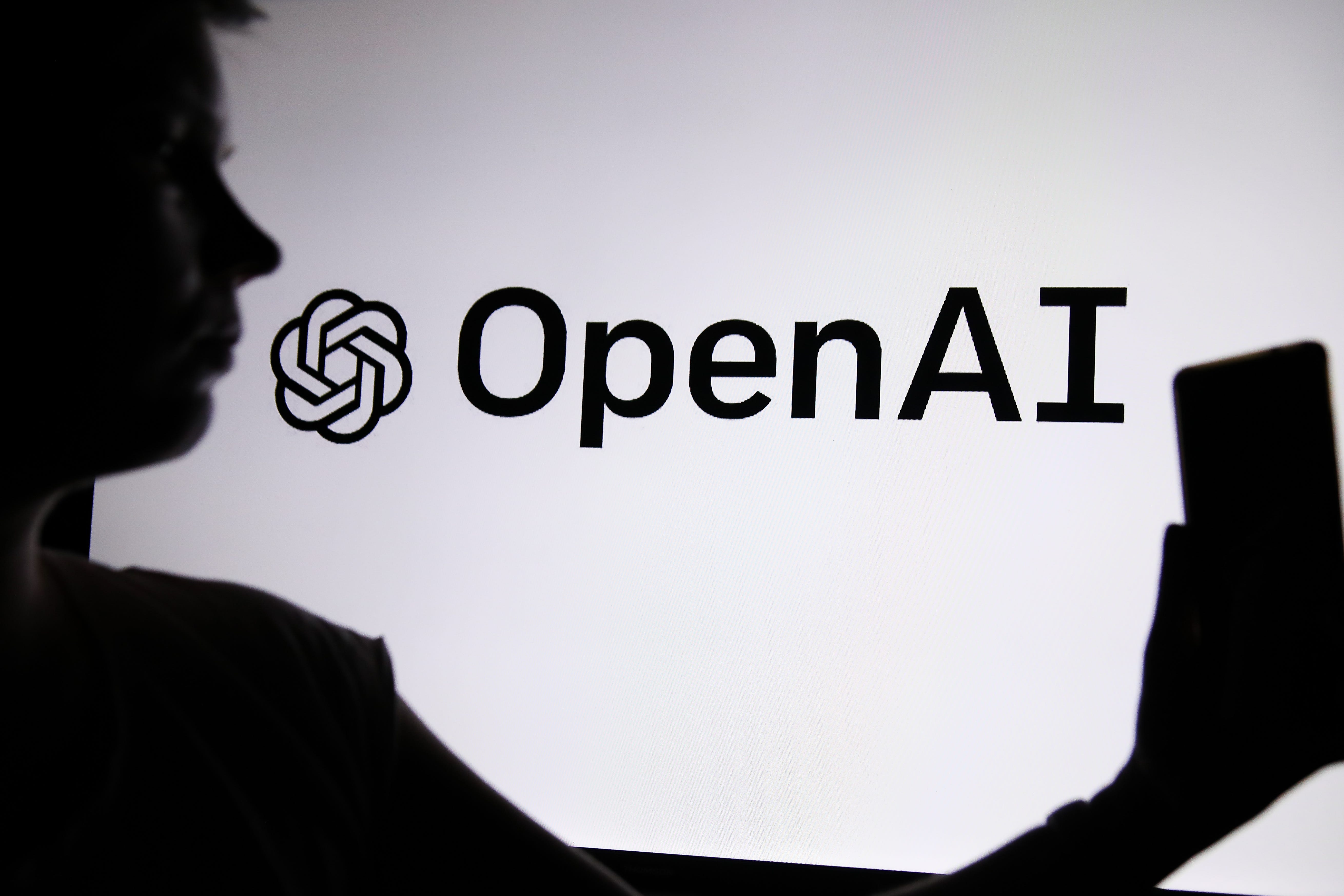 OpenAI logo on a screen