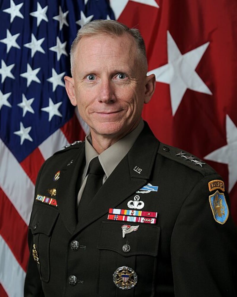 Dan Caine.