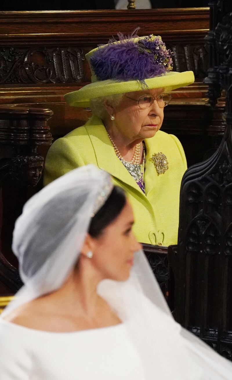 WINDSOR, UNITED KINGDOM - MAY 19: Queen Elizabeth II looks on during  the wedding of Prince Harry to Meghan Markle on May 19, 2018 in Windsor, England. (Photo by  Jonathan Brady - WPA Pool/Getty Images)