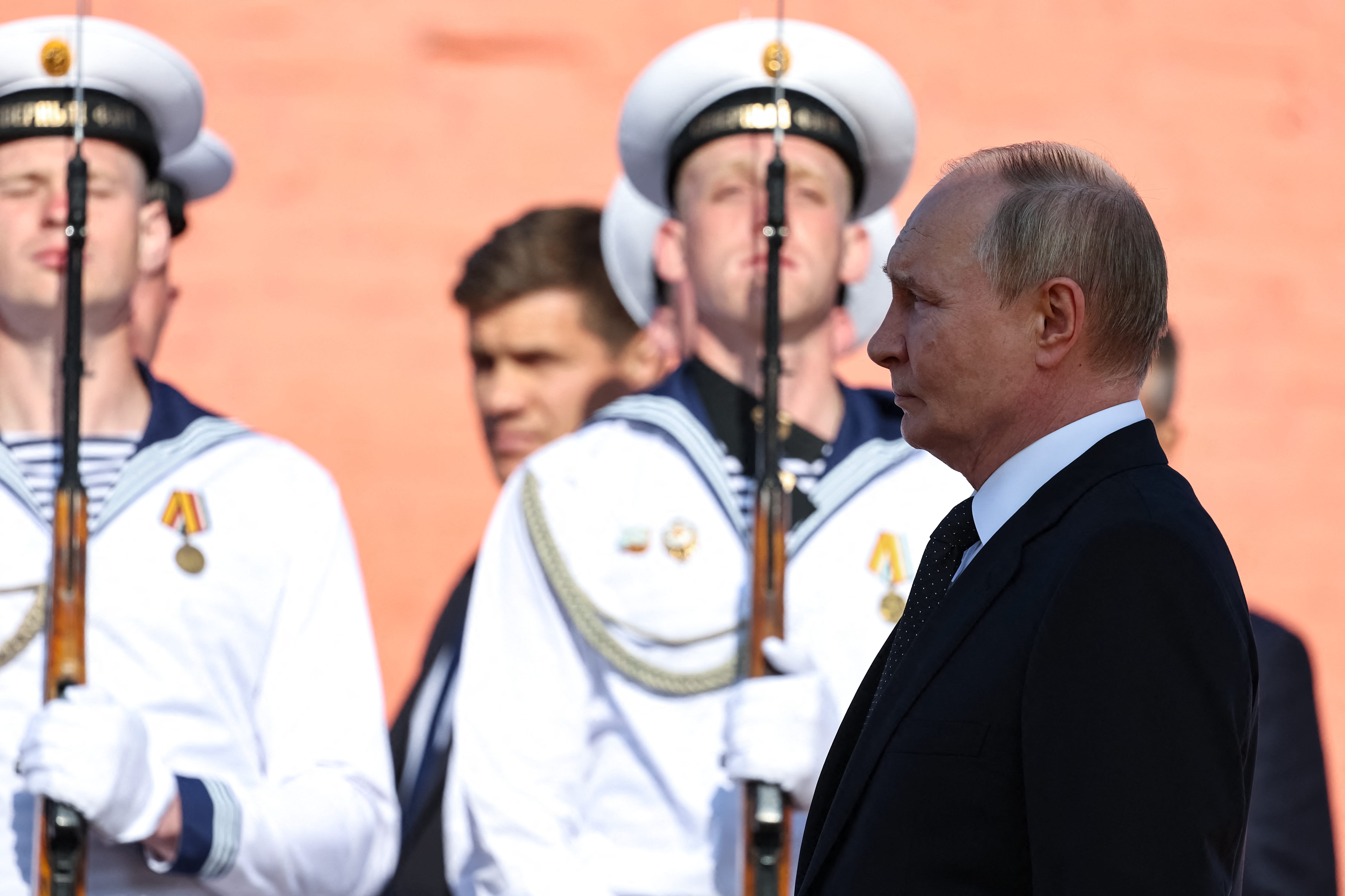 Russia's President Vladimir Putin attends a flag-raising ceremony aboard the latest Project 955A (Borey-A) strategic nuclear-powered submarine Knyaz Pozharsky in Severodvinsk, Russia.