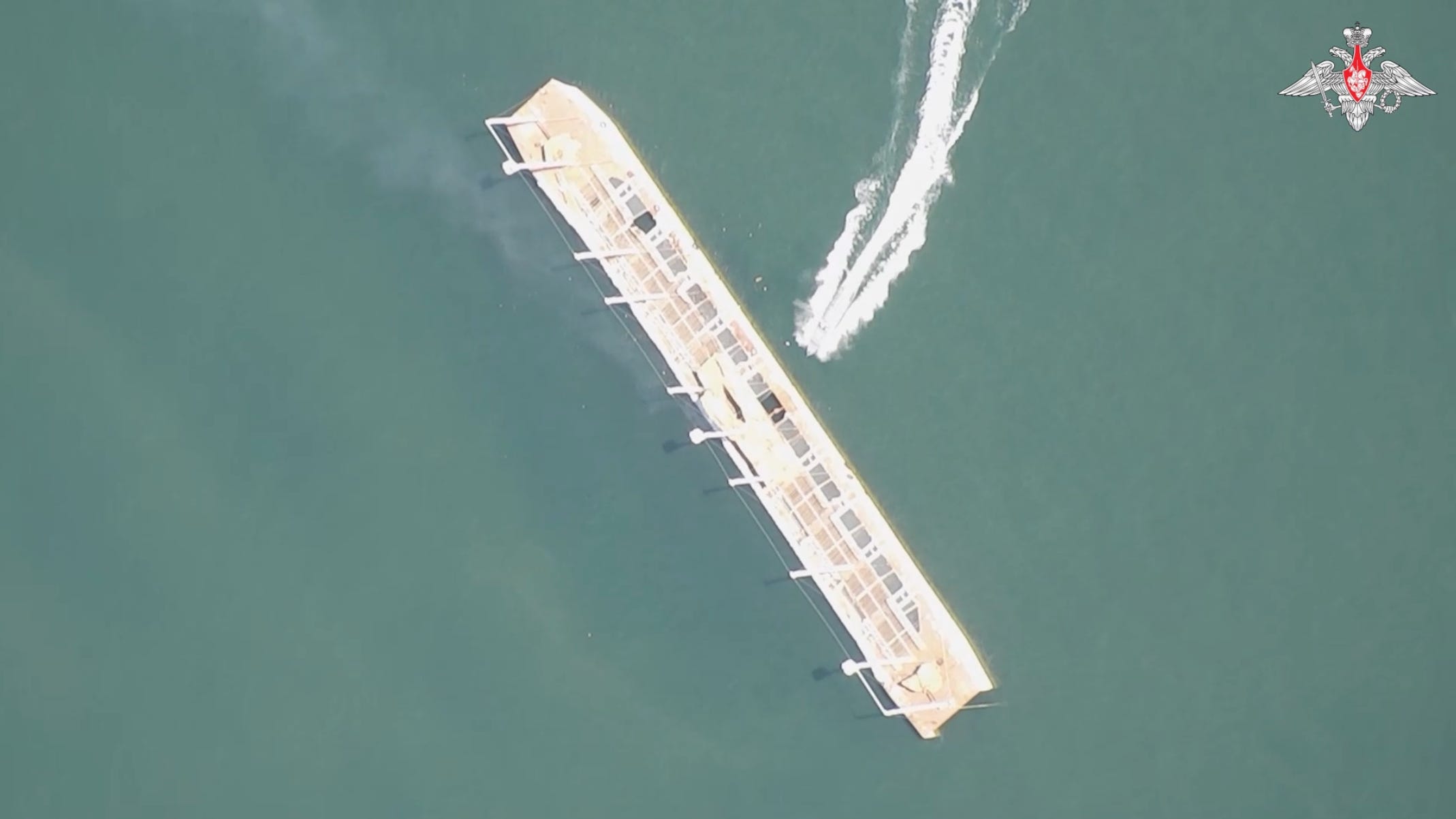 A Russian naval drone approaches a mock target during a series of exercises in July.
