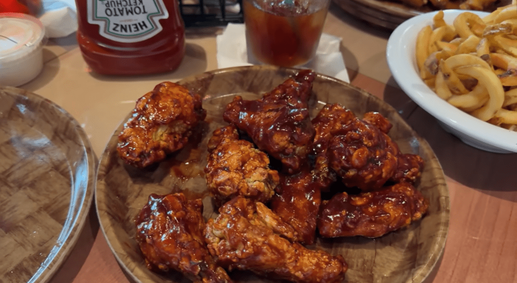 BBQ chicken wings on a plate.