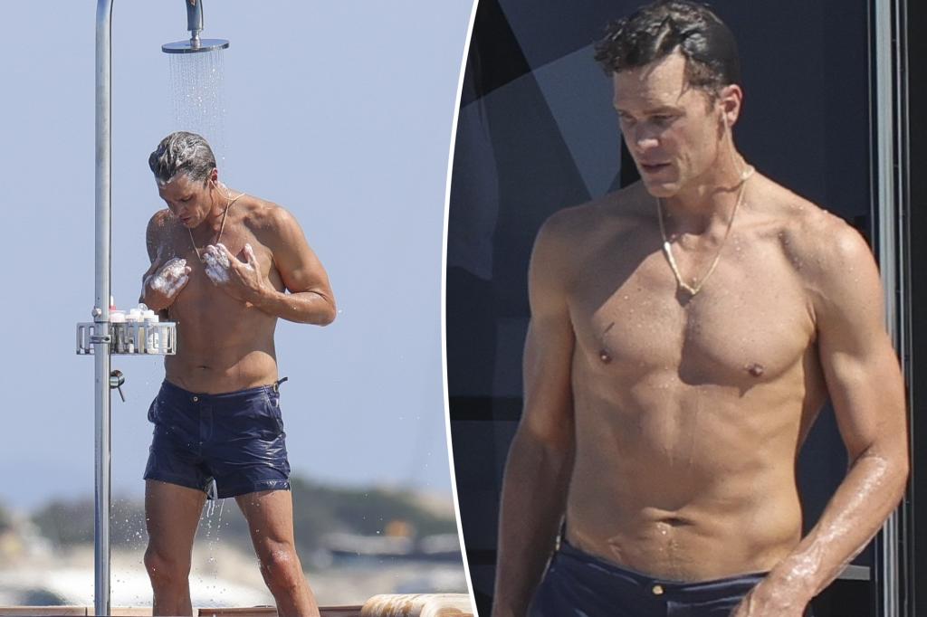 Shirtless Tom Brady rinses off in outdoor shower while yachting in Ibiza on Fourth of July