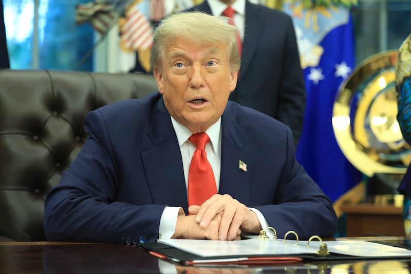 WASHINGTON, DC - JUNE 27: U.S. President Donald Trump delivers remarks as he meets with Minister of Foreign Affairs and Cooperation of Rwanda Olivier Nduhungirehe and the Foreign Minister of the Democratic Republic of the Congo Thérèse Kayikwamba Wagner in the Oval Office at the White House on June 27, 2025. The meeting took place as a peace agreement brokered by the White House, which hopes to end a conflict in eastern Democratic Republic of Congo, was signed by officials of the two African nations. (Photo by Joe Raedle/Getty Images)