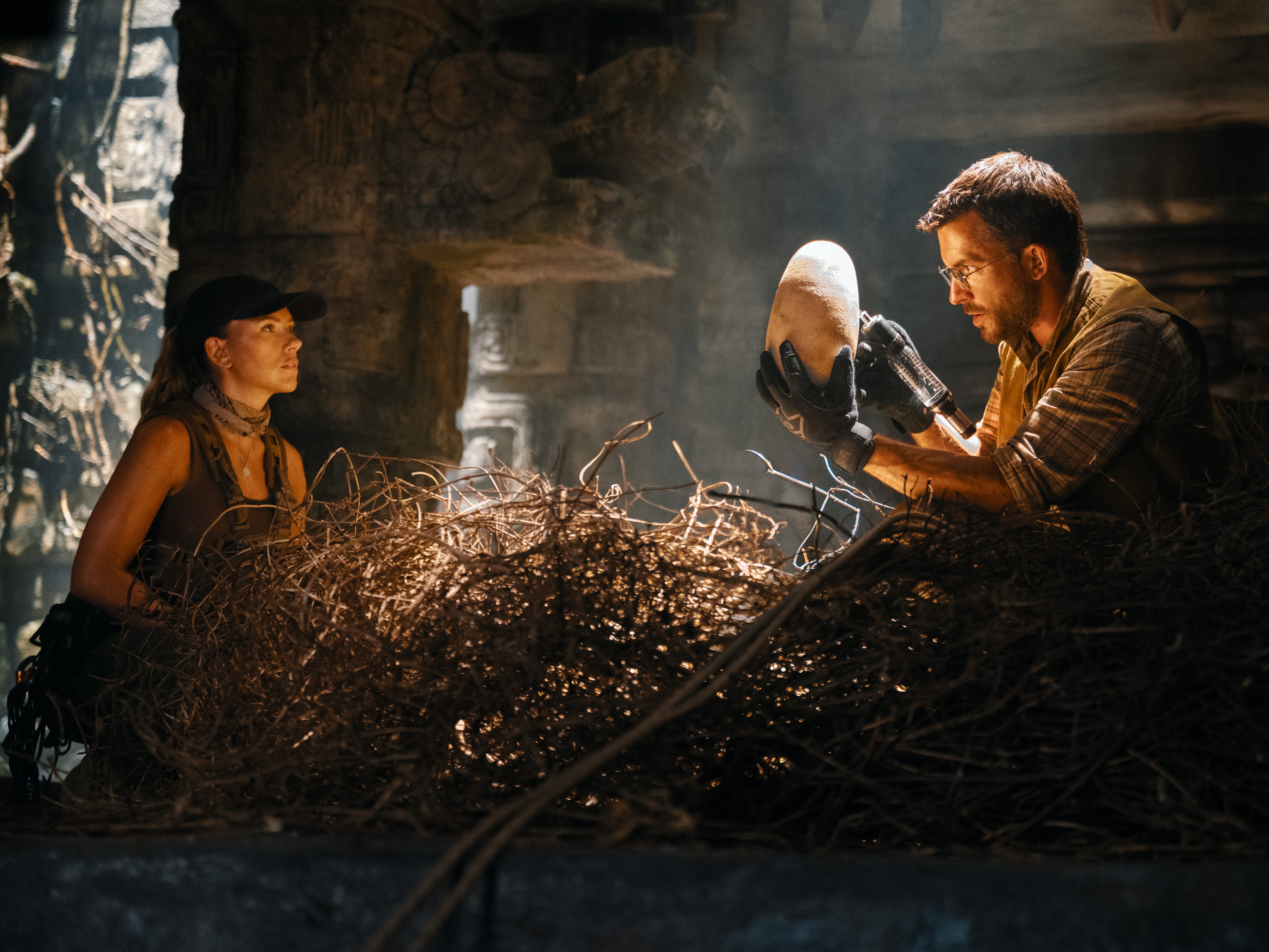 Scarlett Johansson and Jonathan Bailey in a giant nest